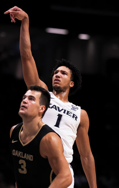 Trey Townsend's 28 Points Lead Oakland To Upset In Cintas Over Xavier 78-76